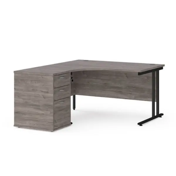 image of Maestro 25 left hand ergonomic desk 1400mm with Black cantilever frame and desk high pedestal - grey oak