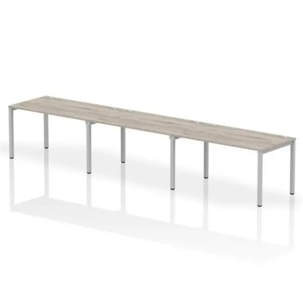 Image of Impulse Bench Single Row 3 Person 1400 Silver Frame Office Bench Desk Grey Oak