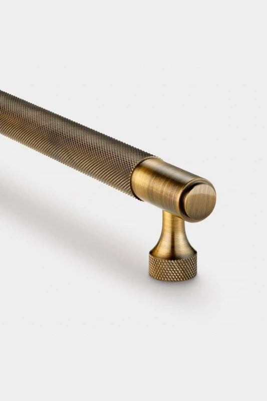 Image of PUSHKA HOME Solid Brass Knurled Bar Handle with Hole Centre 224mm - Antique Gold Gold Unisex