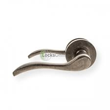 Image of LocksOnline Turin Lever Door Handle on Round Rosette