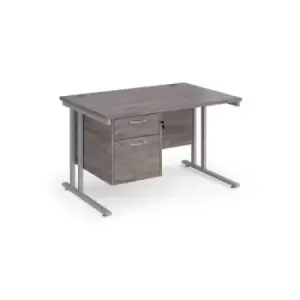 image of Maestro 25 straight desk 1200mm x 800mm with 2 drawer pedestal - silver cantilever leg frame and grey oak top