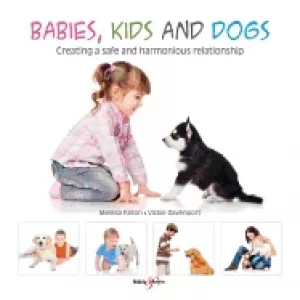 Image of babies kids and dogs creating a safe and harmonious relationship