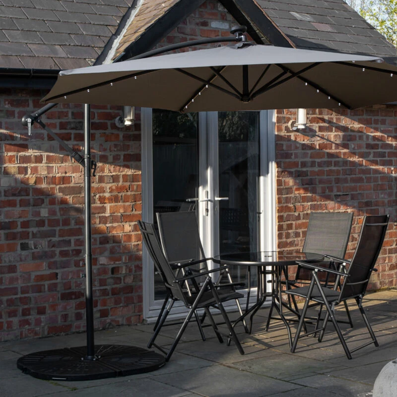 Image of Outdoor 4 Person Round Glass Top Garden Dining Table Chairs With Grey Banana Lit Parasol and Base Set