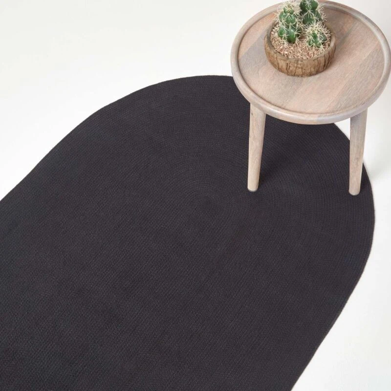 Image of Homescapes Black Handmade Woven Braided Oval Rug, 90 X 150 Cm