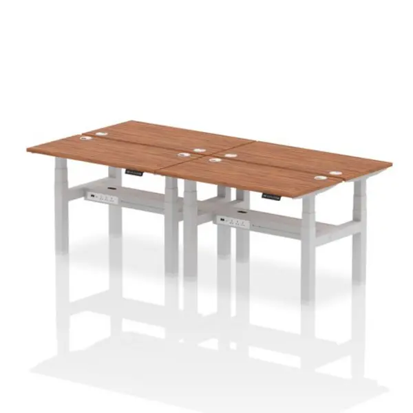 Image of Air Air Back-to-Back 1200 x 600mm Height Adjustable 4 Person Bench Desk Walnut Top with Cable Ports Silver Frame HASCP4P12600WNTS