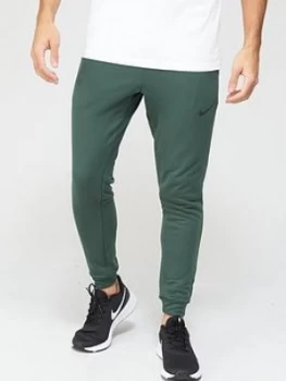 image of Nike Training Dry Tapered Fleece Pants - Green Size M Men