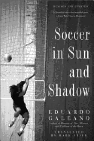 Image of soccer in sun and shadow