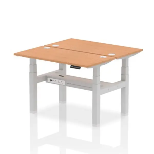 Image of Air Air Back-to-Back 1200 x 600mm Height Adjustable 2 Person Bench Desk Oak Top with Cable Ports Silver Frame HASCP2P12600OAKS