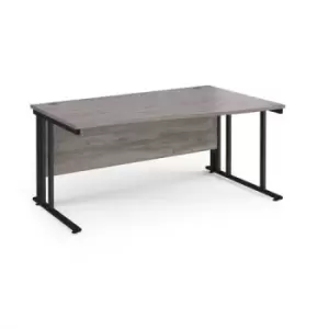 image of Maestro 25 right hand wave desk 1600mm wide - Black cable managed leg frame and grey oak top