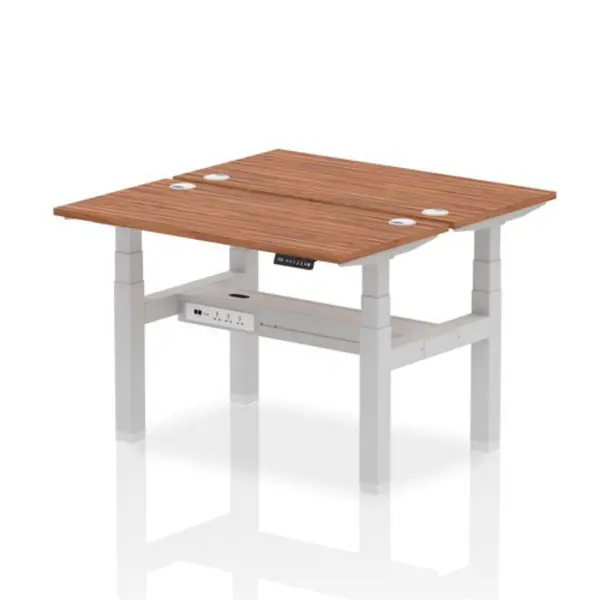 Image of Air Air Back-to-Back 1200 x 600mm Height Adjustable 2 Person Bench Desk Walnut Top with Cable Ports Silver Frame HASCP2P12600WNTS