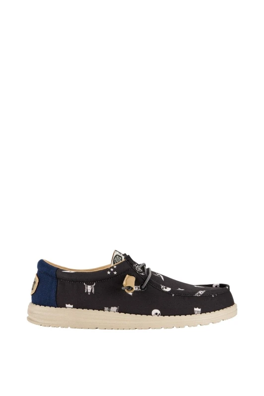 Image of HEYDUDE 'Wally Stars n Skulls' Classic Slip On Shoes Black male