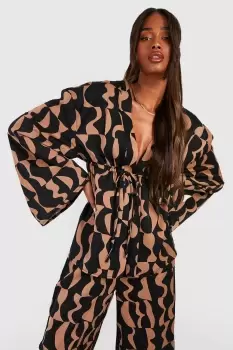 image of Abstract Print Flared Sleeve Blouse