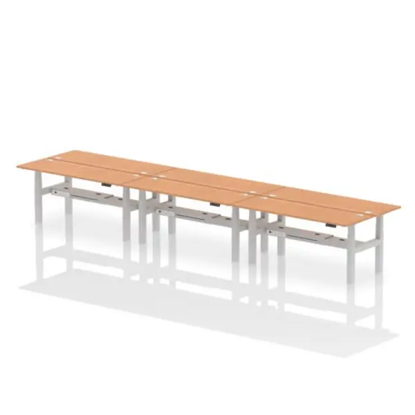 Image of Air Air Back-to-Back 1800 x 600mm Height Adjustable 6 Person Bench Desk Oak Top with Cable Ports Silver Frame HASCP6P18600OAKS
