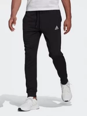 Image of adidas Essentials French Terry Tapered Cuff Joggers, Black, Size 2XL, Men