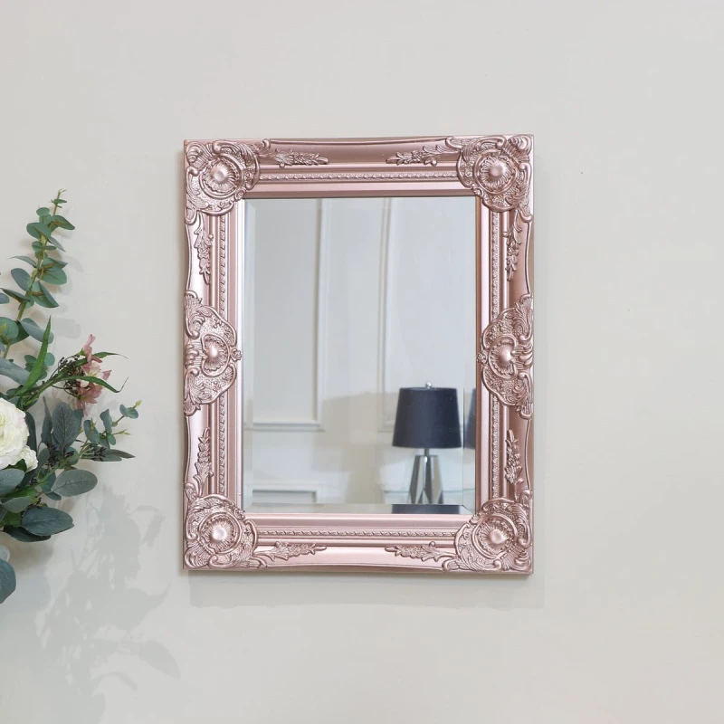 Image of Melody Maison Ornate Rose Gold Pink Wall Mirror With Bevelled Glass Rose Gold