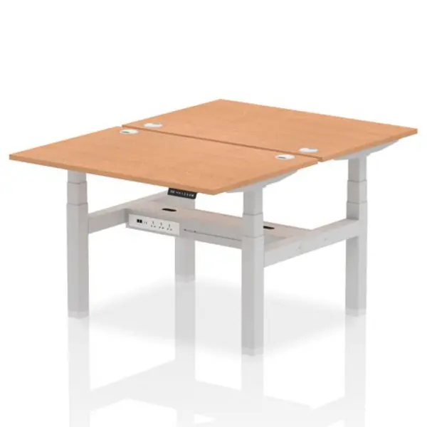 Image of Air Air Back-to-Back 1200 x 800mm Height Adjustable 2 Person Bench Desk Oak Top with Cable Ports Silver Frame HASCP2P12800OAKS