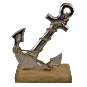 Image of Silver Metal Anchor Ornament On Wooden Base