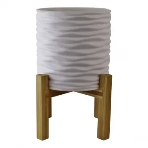 Image of Small White Stoneware Planter On Wooden Stand