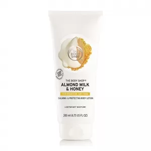 image of The Body Shop Almond Milk & Honey Soothing & Restoring Body Lotion Almond Milk & Honey Soothing & Restoring Body Lotion