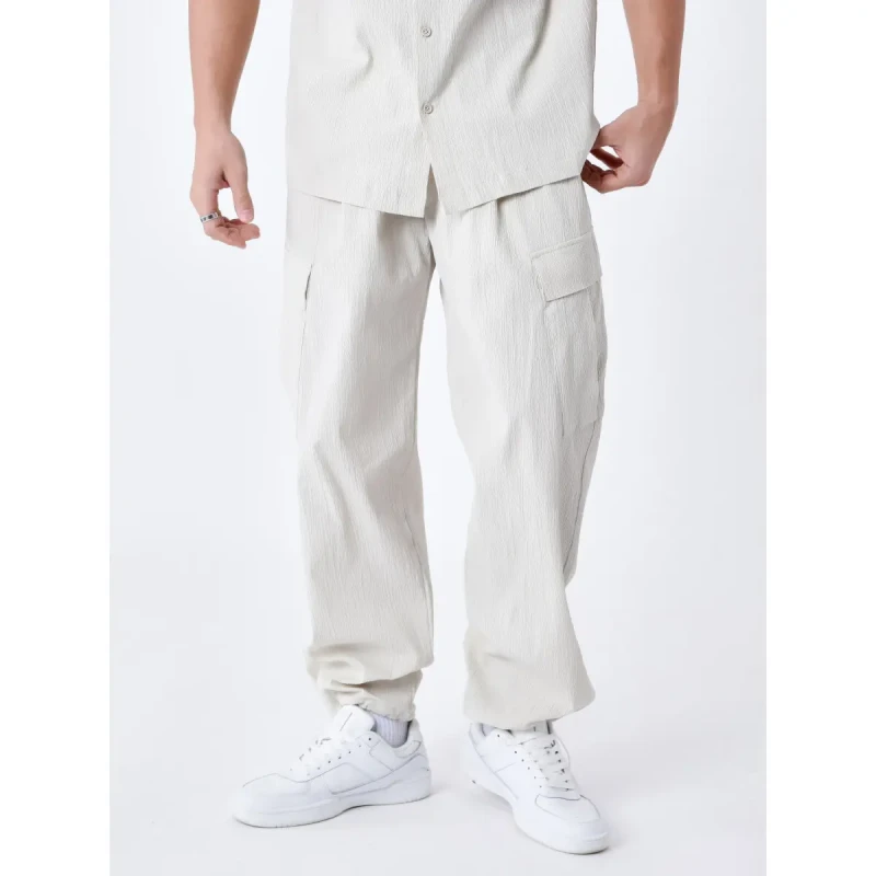 Image of Project X Paris Wrinkled effect trousers with pockets Project X Paris Beige Male S