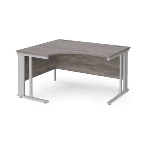 image of Maestro 25 left hand ergonomic desk 1400mm wide - silver cable managed leg frame, grey oak top