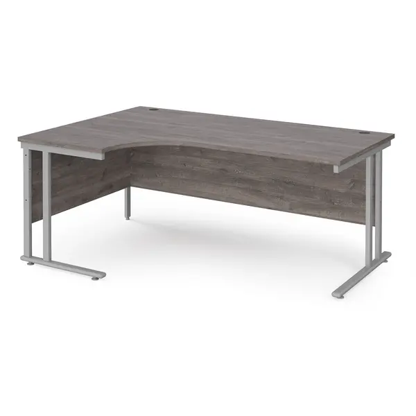 image of Maestro 25 Left Hand Ergonomic Desk with Silver Frame and Grey Oak Top - 1800mm