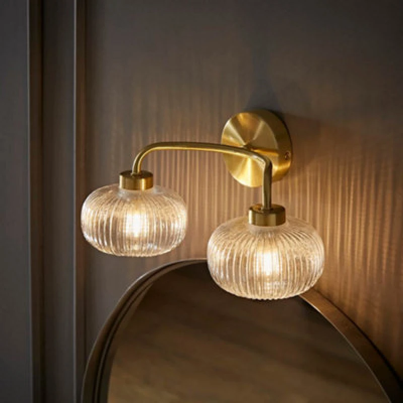 Image of ValueLights Amaia Brushed Gold IP44 Rated 2 Way Clear Ribbed Glass Wall Light Gold