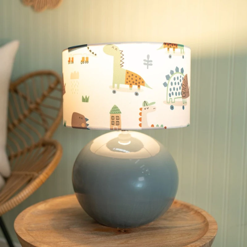 Image of ValueLights Bosco Eucalyptus Teal Globe Ceramic Table Lamp with Cartoon Dino Shade and Bulb Multi