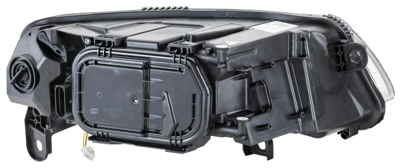 Image of HELLA 1EL 009 925-511 Headlights H7, with bulb, Left, with motor for headlamp levelling, Bi-Xenon Headlight (259)
