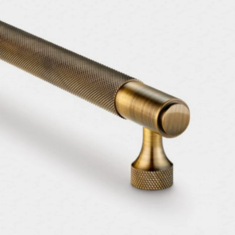 Image of Pushka Home Brass Knurled Bar Handle With Hole Centre 128mm - Antique Gold