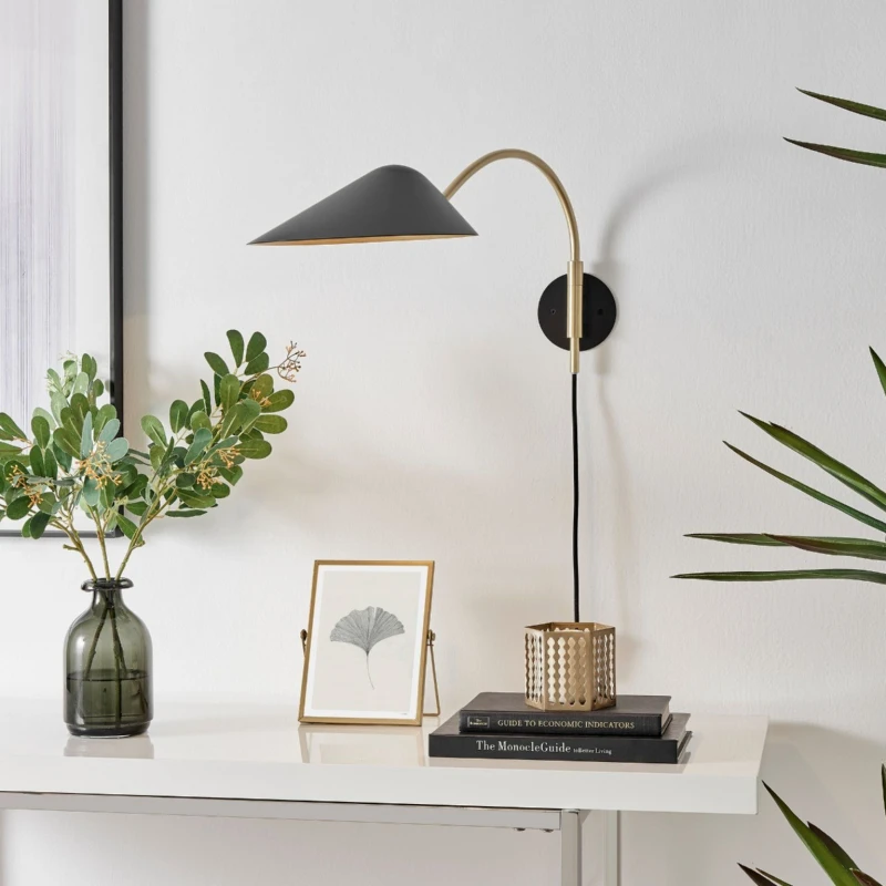 Image of FurnitureboxUK FurnitureboxUK Poppy Brushed Brass Retro Wall Lamp With Matte Black Shade in Gold Gold One Size Unisex 5056542694417