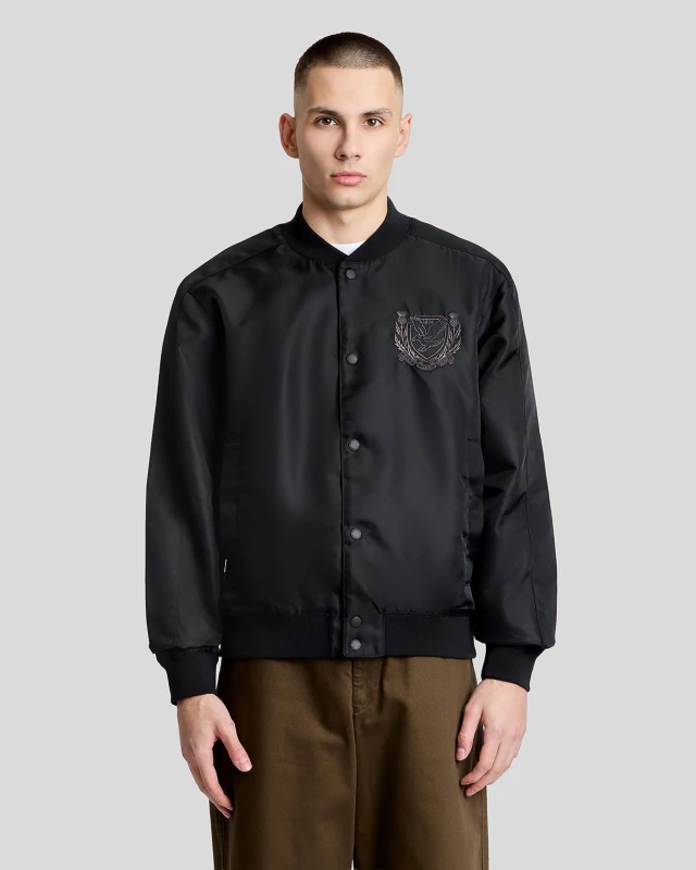 Image of Lyle & Scott Mens Embroidered Crest Varsity Jacket in Black