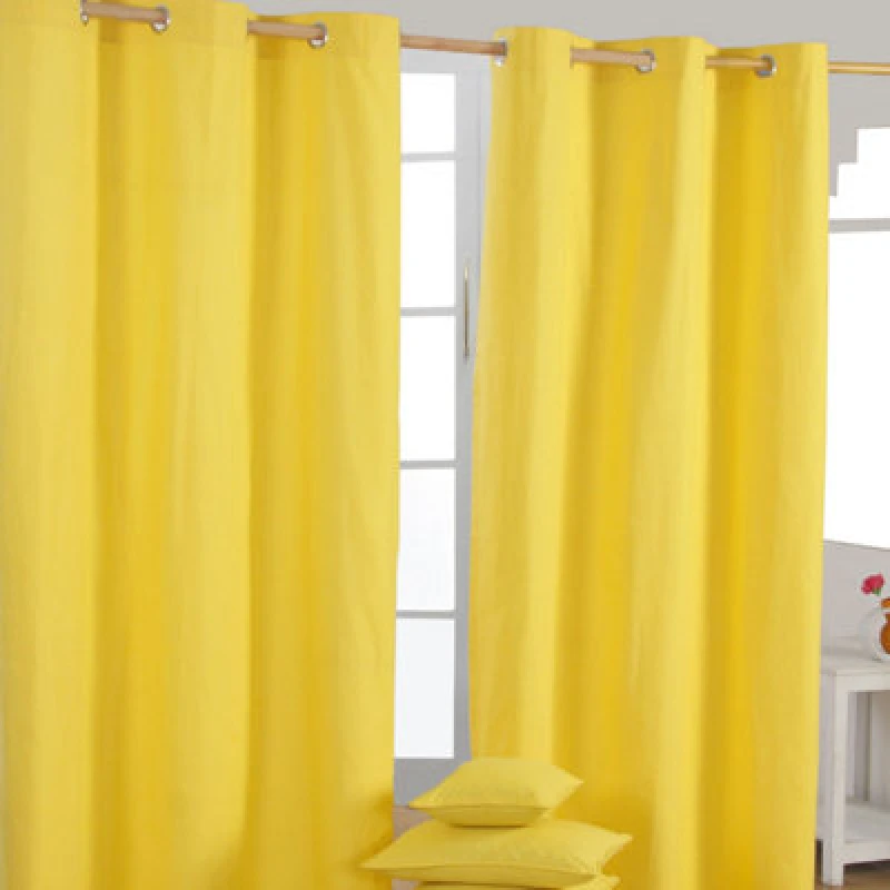 Image of Homescapes Plain Yellow Cotton Eyelet Curtains 137 X 228 Cm