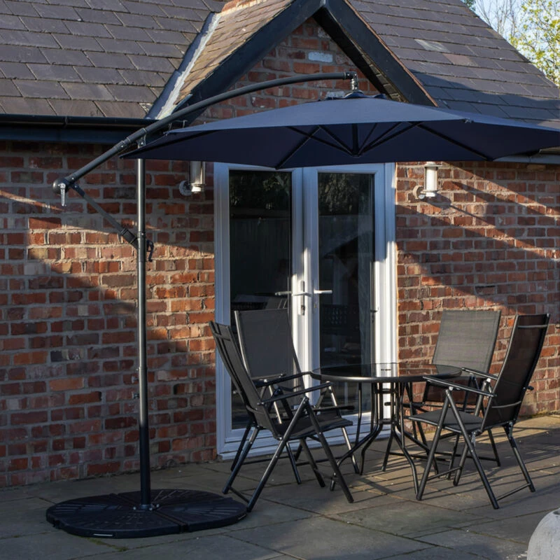Image of Outdoor 4 Person Round Glass Top Garden Dining Table Chairs With Blue Banana Parasol and Base Set