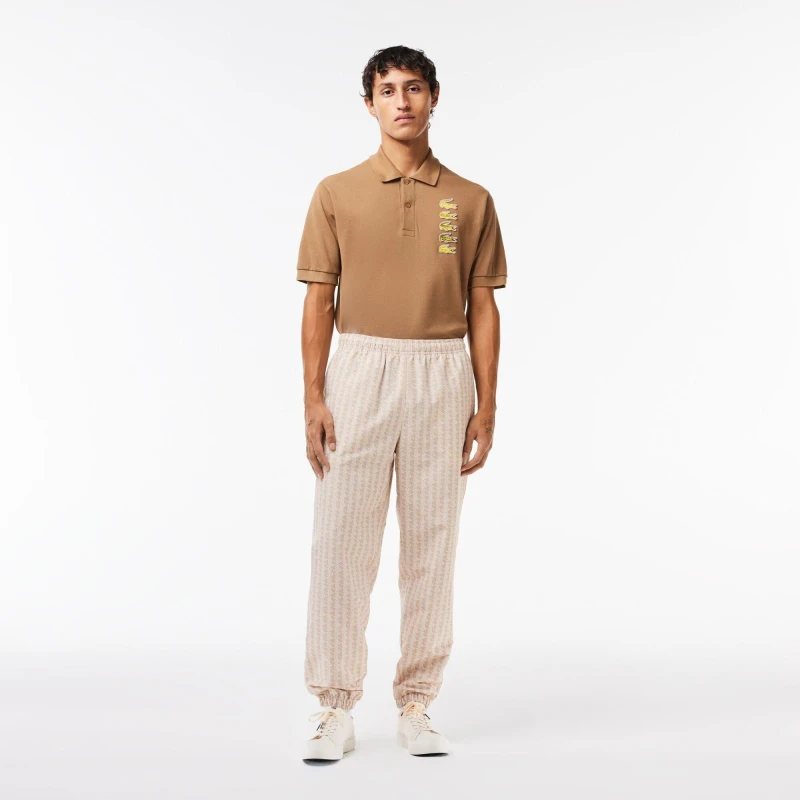 Image of Lacoste Mens Monogram Print Fleece Closed Cuff Joggers Sawdust/Lapland male XS