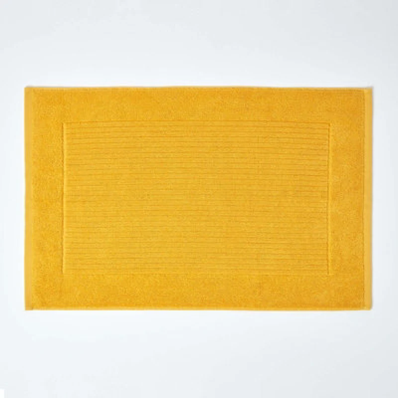 Image of Homescapes Imperial Plain Cotton Bath Mat Yellow