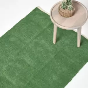 Image of Dark Olive 100% Cotton Plain Chenille Rug with Natural Trim, 110 x 170cm - Green - Homescapes