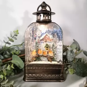 image of 24cm Snowtime Christmas Water Spinner Antique Effect Lantern With Robins on a Branch Scene Dual Power