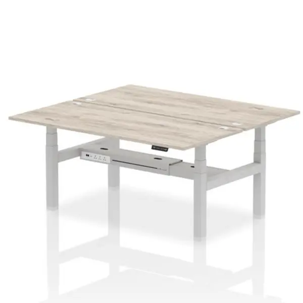 Image of Air Air Back-to-Back 1800 x 800mm Height Adjustable 2 Person Bench Desk Grey Oak Top with Cable Ports Silver Frame HASCP2P18800GRYS