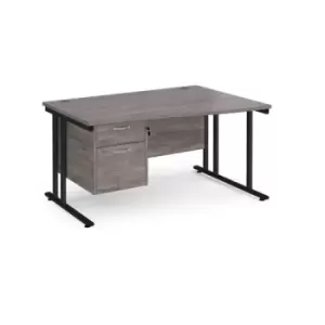 Image of Maestro 25 right hand wave desk 1400mm wide with 2 drawer pedestal - Black cantilever leg frame and grey oak top