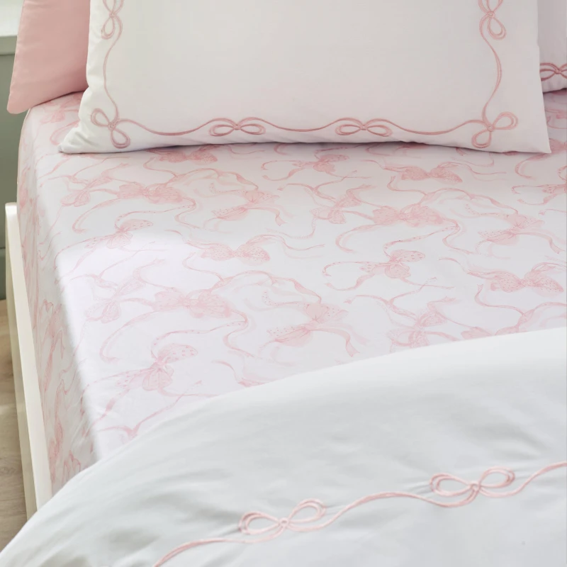 Image of Catherine Lansfield Catherine Lansfield 'Bow' Fitted Sheet in Pink Size: King Fitted Pink King Fitted Unisex 5057681186757