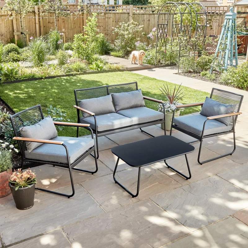 Image of Home Source Cove Black Metal 4 Piece Outdoor Garden Table And Chair Set Padded Cushion Glass Tabletop