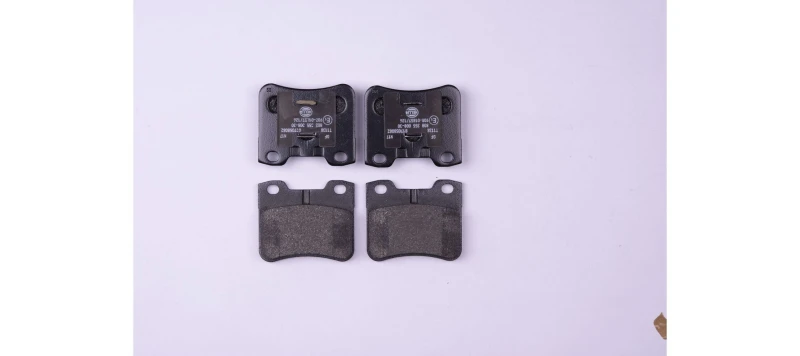 Image of HELLA Brake pad set HELLA 8DB 355 008-301