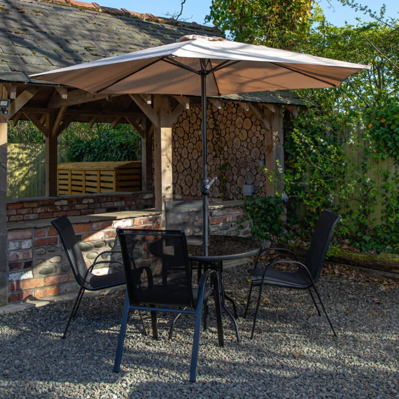 Image of Outdoor 4 Person Round Glass Top Garden Dining Table Chairs With Beige Banana Parasol and Base