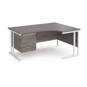 Image of Maestro 25 right hand ergonomic desk 1600mm wide with 3 drawer pedestal - white cantilever leg frame and grey oak top