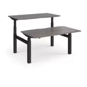 image of Elev8 Touch sit-stand back-to-back desks 1400mm x 1650mm - Black frame and grey oak top