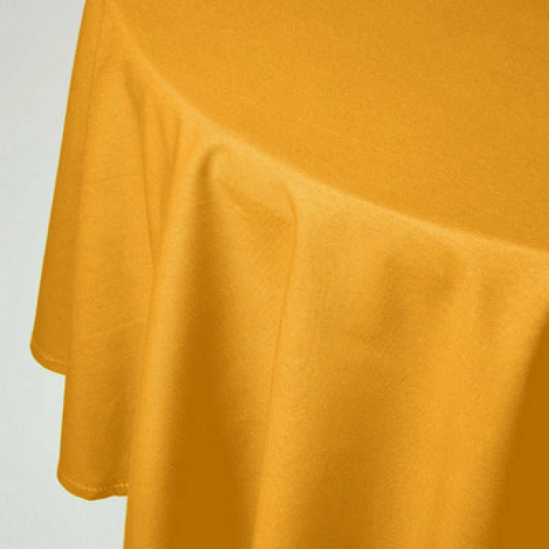 Image of Homescapes Plain Cotton Round Tablecloth, 178cm Mustard