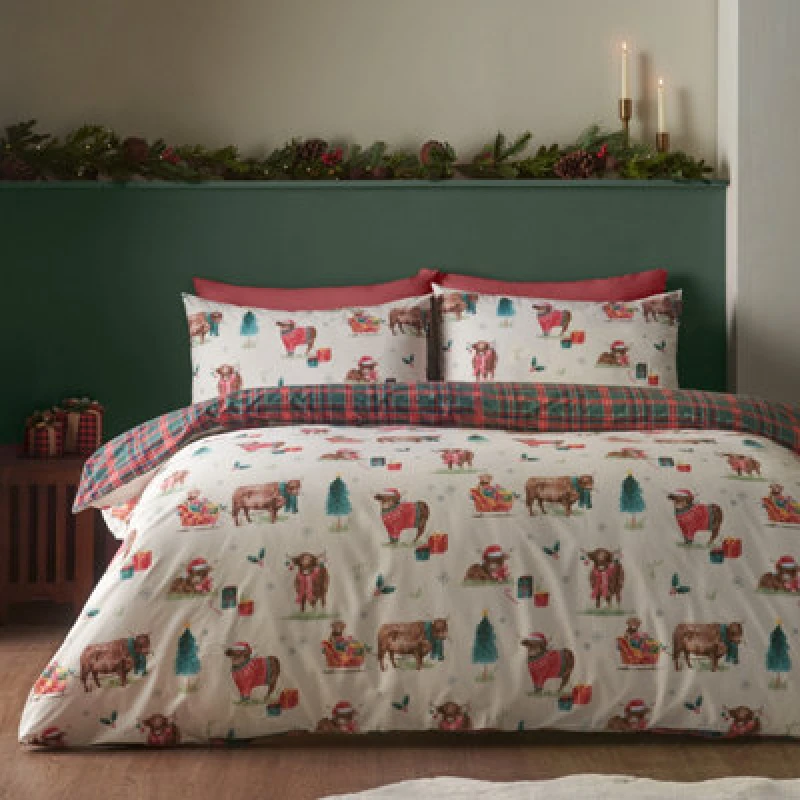 Image of Catherine Lansfield Christmas Highland Cow Reversible Double Duvet Cover Set With Pillowcases Natural