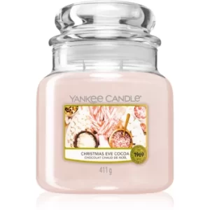 Image of Yankee Candle Original Medium Jar Christmas Eve Cocoa