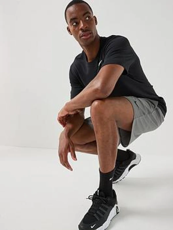 Image of Nike Dri-FIT Totality Mens 7 Unlined Knit Fitness Shorts - Grey Male M
